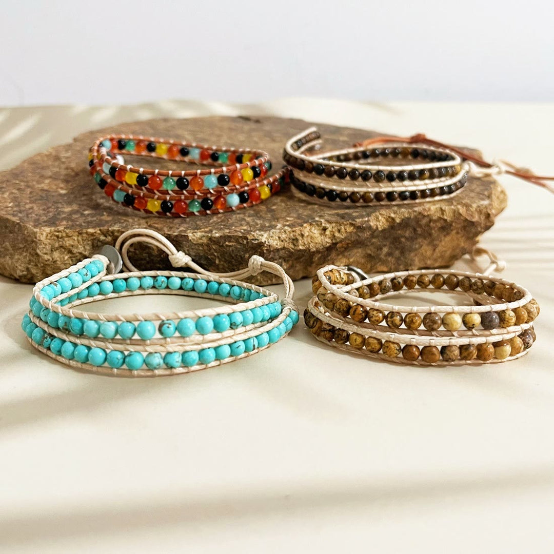 Olivenorma Bracciale intrecciato in corda di pelle con perline di pietra naturale