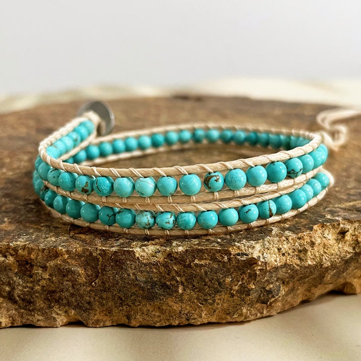 Olivenorma Bracciale intrecciato in corda di pelle con perline di pietra naturale