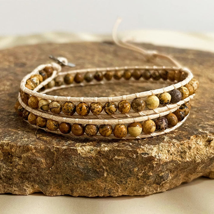 Olivenorma Bracciale intrecciato in corda di pelle con perline di pietra naturale