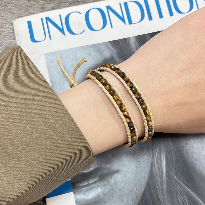 Olivenorma Bracciale intrecciato in corda di pelle con perline di pietra naturale