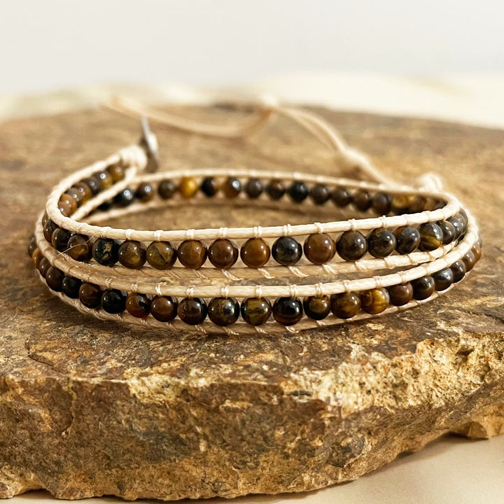 Olivenorma Bracciale intrecciato in corda di pelle con perline di pietra naturale