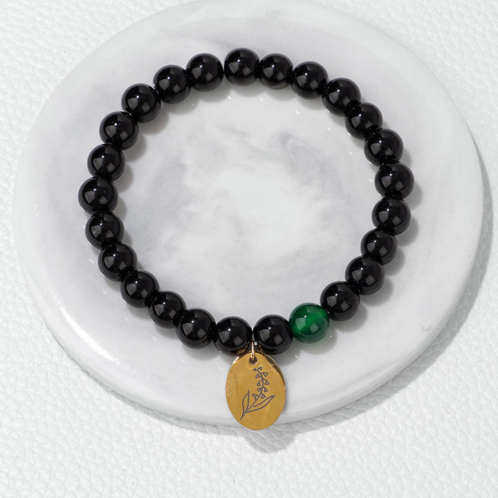 Olivenorma Bracciale in metallo con fiore di nascita con perline di ossidiana da 8 mm