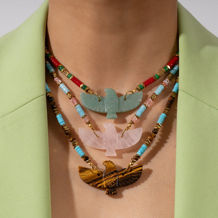 Collana con ciondolo di perline in pietra naturale Olivenorma con aquila intagliata