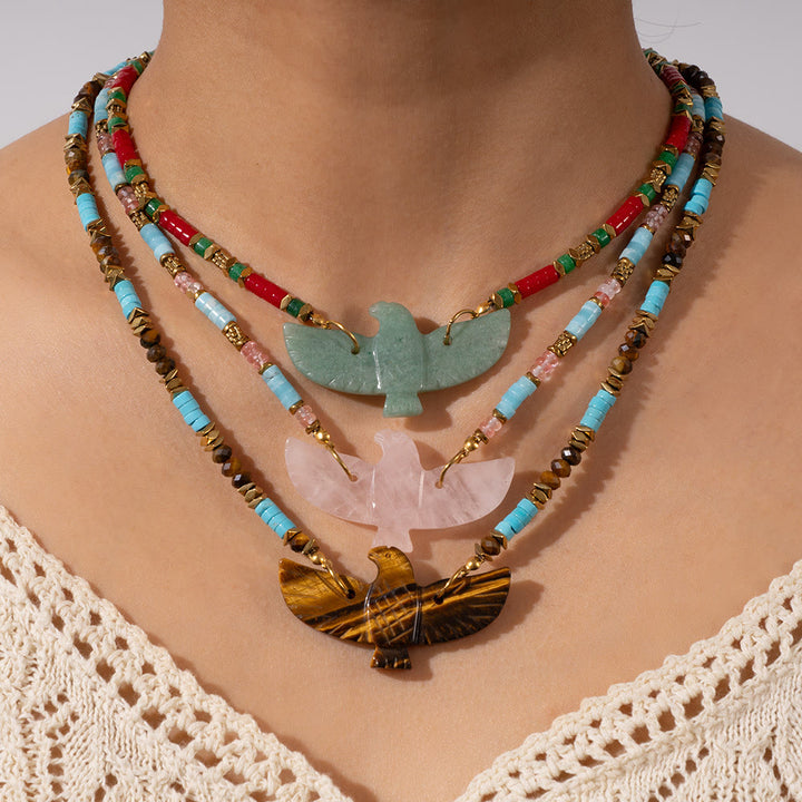 Collana con ciondolo di perline in pietra naturale Olivenorma con aquila intagliata