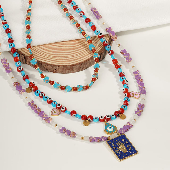 Collana con ciondolo in pietra dell'imperatore Olivenorma con occhio malvagio