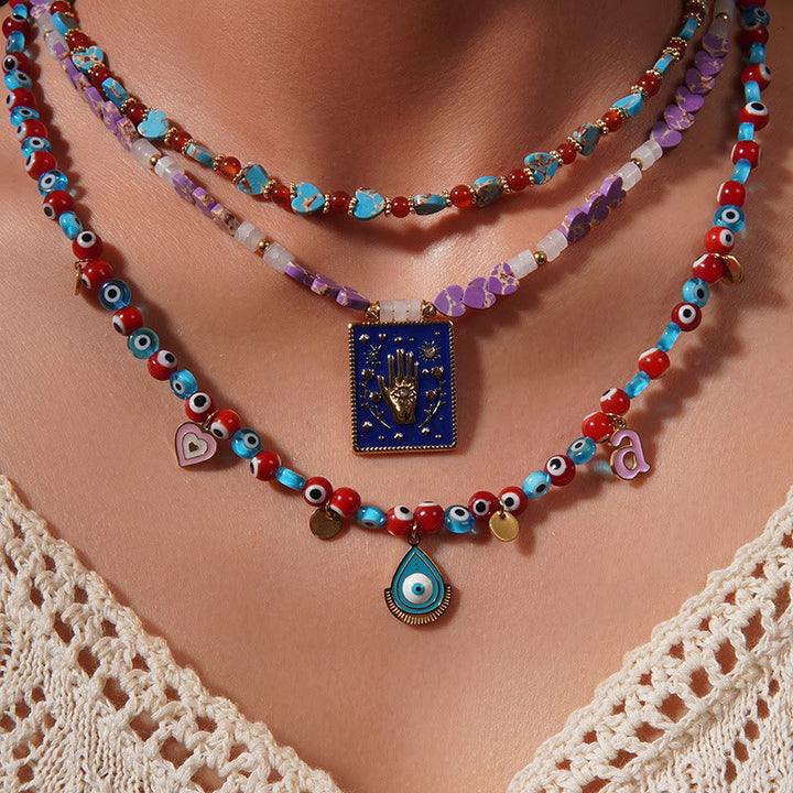 Collana con ciondolo in pietra dell'imperatore Olivenorma con occhio malvagio