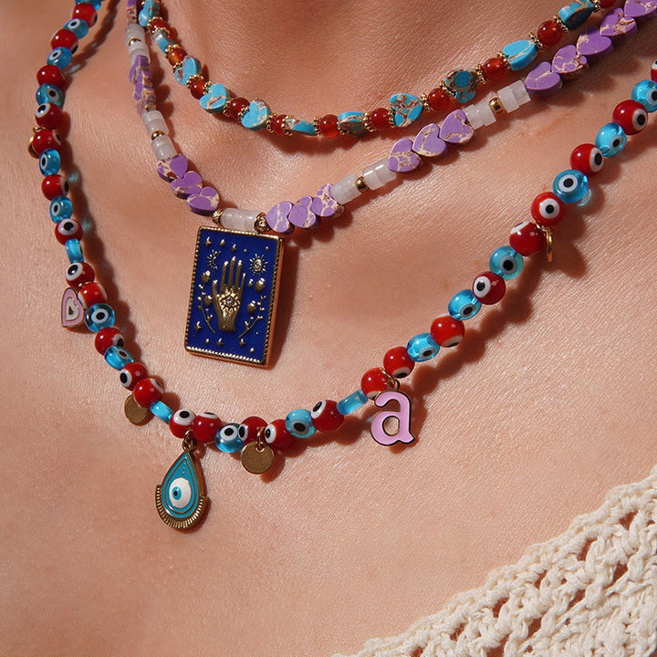 Collana con ciondolo in pietra dell'imperatore Olivenorma con occhio malvagio
