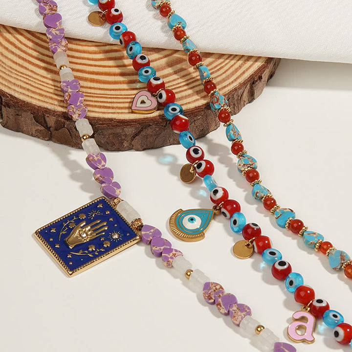 Collana con ciondolo in pietra dell'imperatore Olivenorma con occhio malvagio