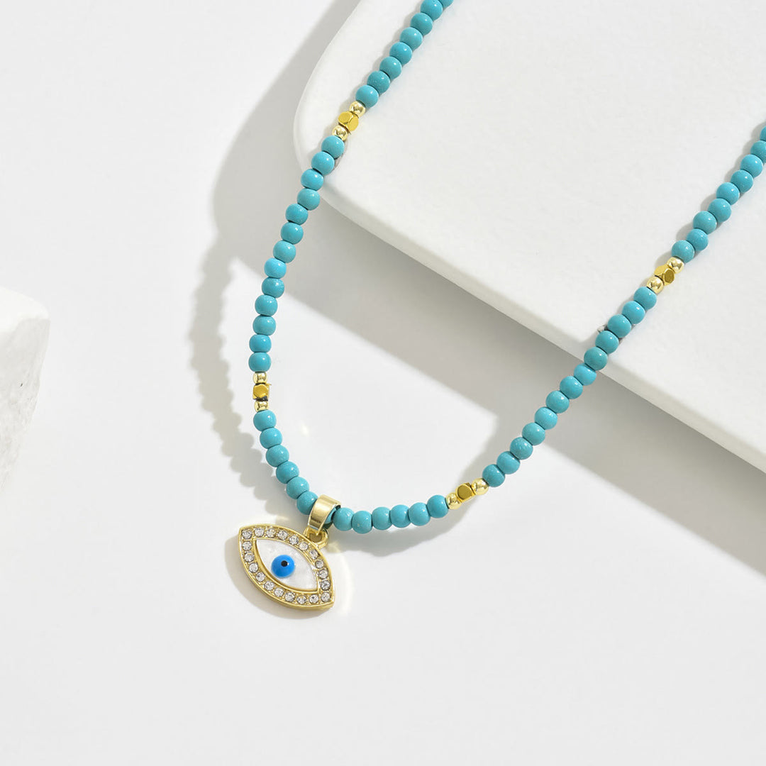 Collana con ciondolo a forma di malocchio con perline di cristallo naturale Olivenorma