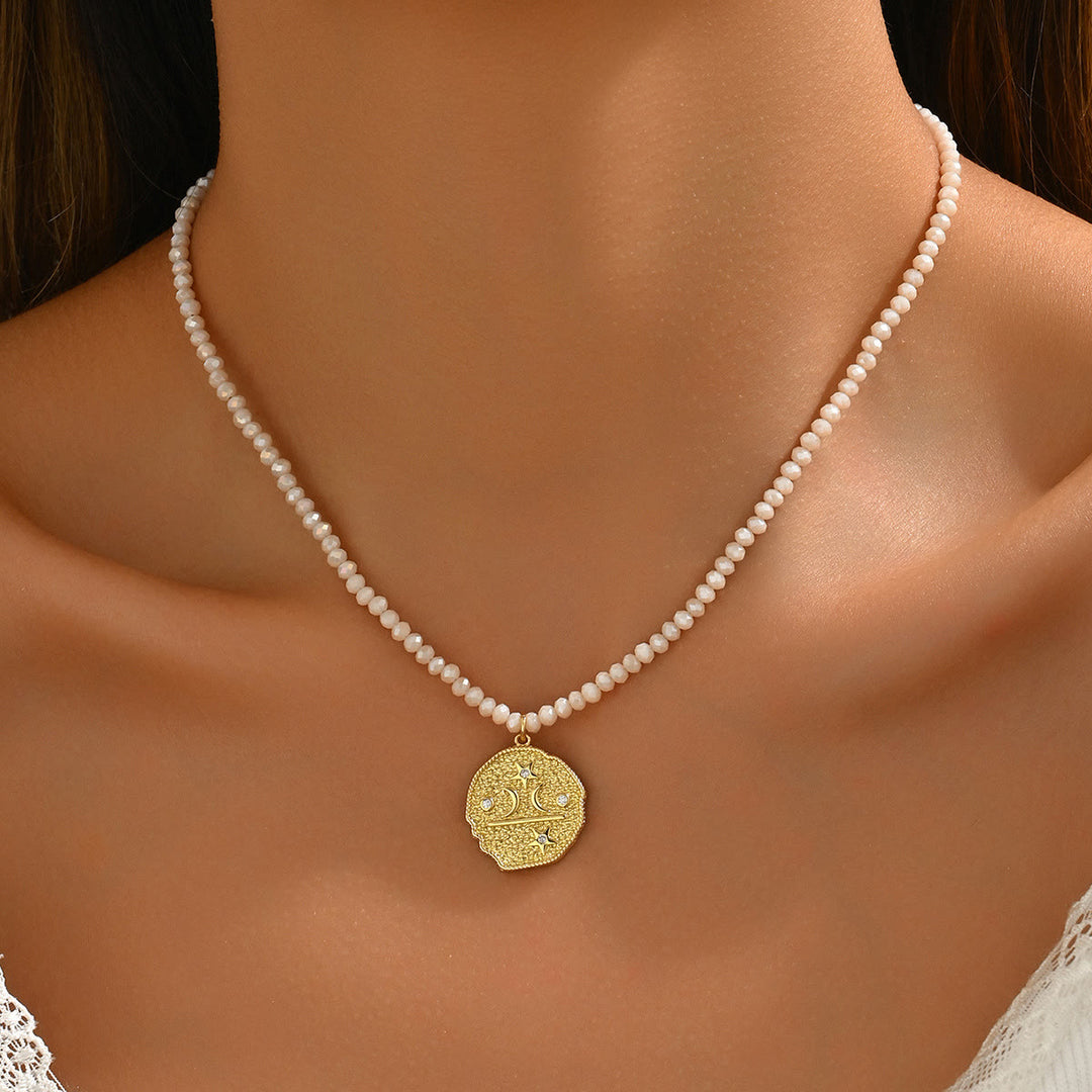 Collana con ciondolo a forma di malocchio con perline di cristallo naturale Olivenorma