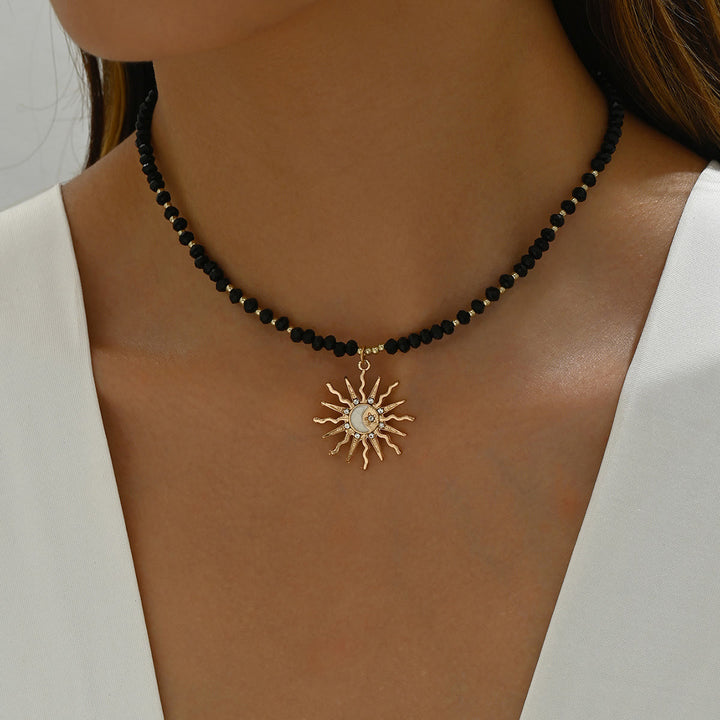 Collana con ciondolo a forma di malocchio con perline di cristallo naturale Olivenorma