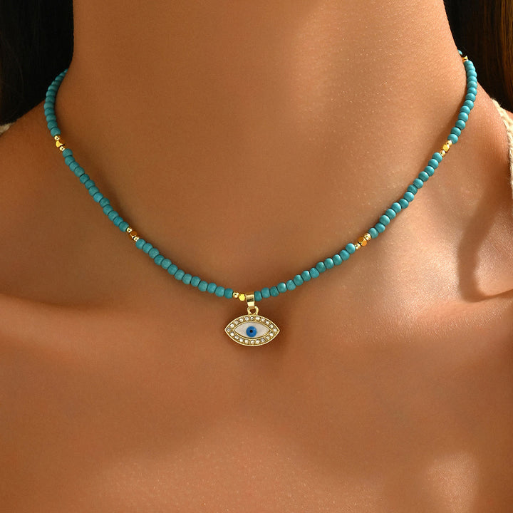 Collana con ciondolo a forma di malocchio con perline di cristallo naturale Olivenorma