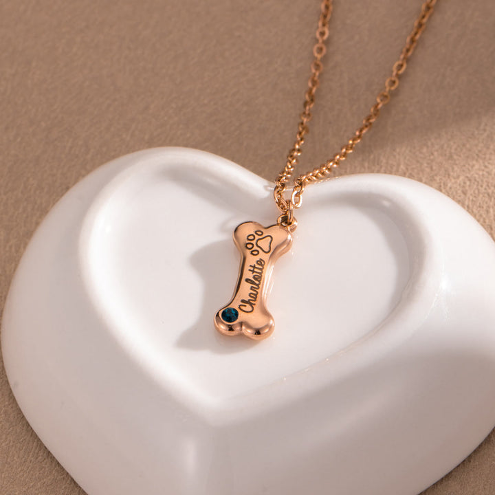 Collana personalizzata Olivenorma in acciaio inossidabile con pietra portafortuna a forma di osso di cane