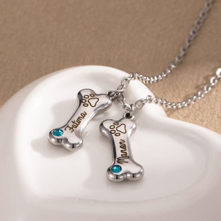 Collana personalizzata Olivenorma in acciaio inossidabile con pietra portafortuna a forma di osso di cane
