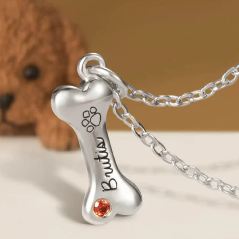 Collana personalizzata Olivenorma in acciaio inossidabile con pietra portafortuna a forma di osso di cane