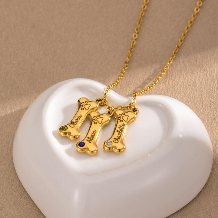 Collana personalizzata Olivenorma in acciaio inossidabile con pietra portafortuna a forma di osso di cane