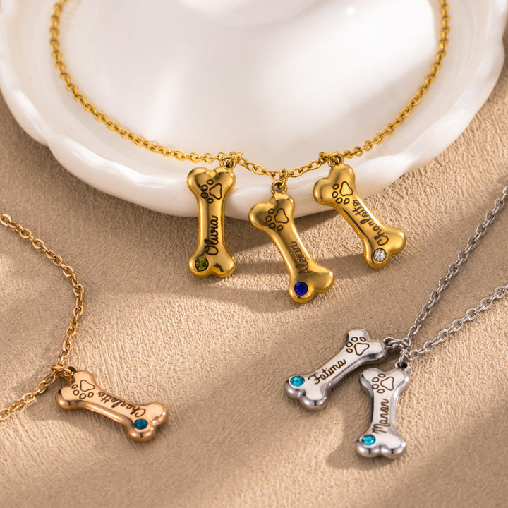 Collana personalizzata Olivenorma in acciaio inossidabile con pietra portafortuna a forma di osso di cane