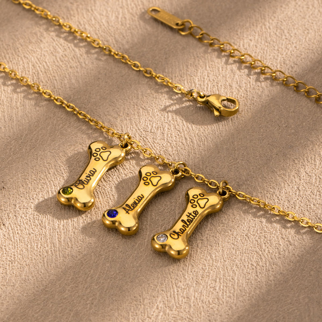 Collana personalizzata Olivenorma in acciaio inossidabile con pietra portafortuna a forma di osso di cane