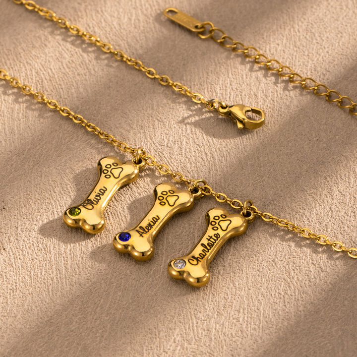 Collana personalizzata Olivenorma in acciaio inossidabile con pietra portafortuna a forma di osso di cane