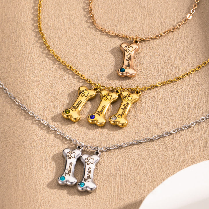 Collana personalizzata Olivenorma in acciaio inossidabile con pietra portafortuna a forma di osso di cane