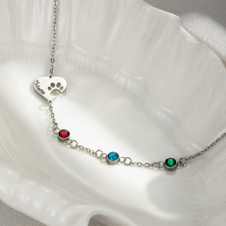 Collana personalizzata Olivenorma con pietra portafortuna a forma di cuore cavo e zampa di cane