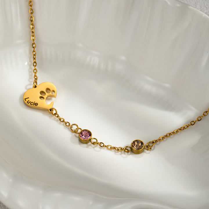 Collana personalizzata Olivenorma con pietra portafortuna a forma di cuore cavo e zampa di cane
