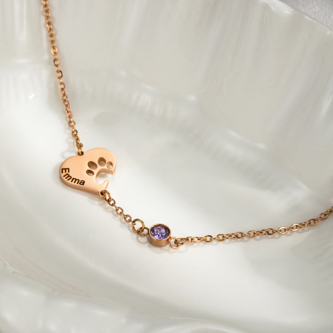 Collana personalizzata Olivenorma con pietra portafortuna a forma di cuore cavo e zampa di cane