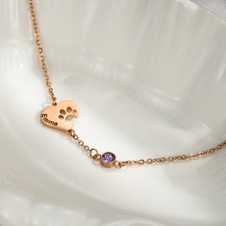 Collana personalizzata Olivenorma con pietra portafortuna a forma di cuore cavo e zampa di cane
