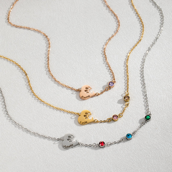 Collana personalizzata Olivenorma con pietra portafortuna a forma di cuore cavo e zampa di cane