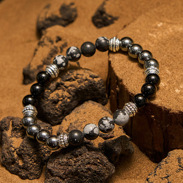 Bracciale da uomo Olivenorma con perline di ematite e ossidiana a fiocco di neve