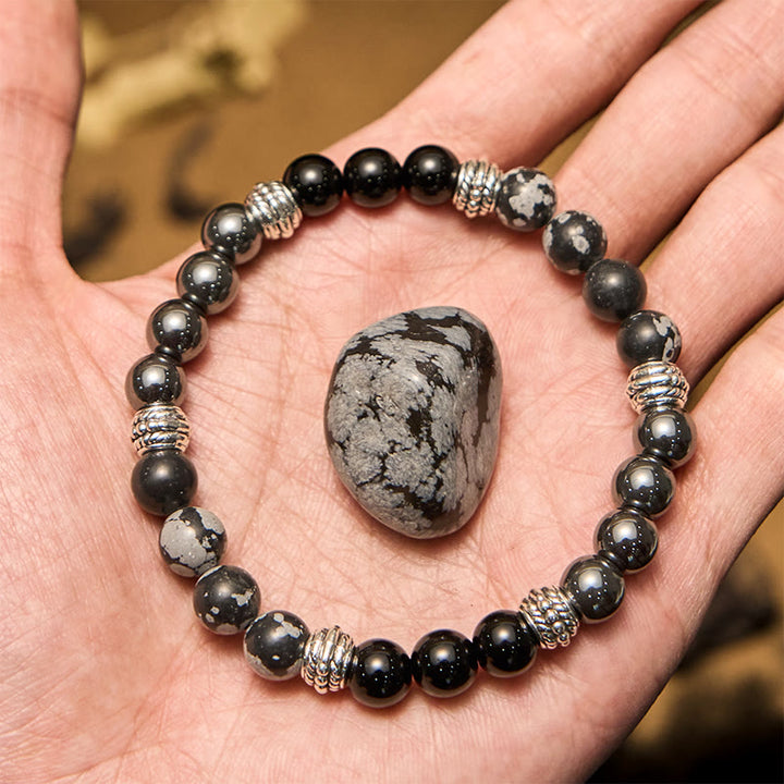 Bracciale da uomo Olivenorma con perline di ematite e ossidiana a fiocco di neve