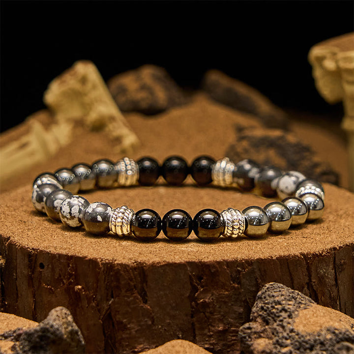 Bracciale da uomo Olivenorma con perline di ematite e ossidiana a fiocco di neve