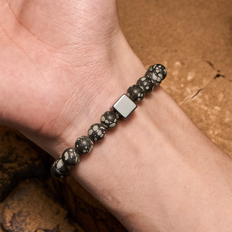 Bracciale Olivenorma con perline di ematite a taglio quadrato in ossidiana fiocco di neve
