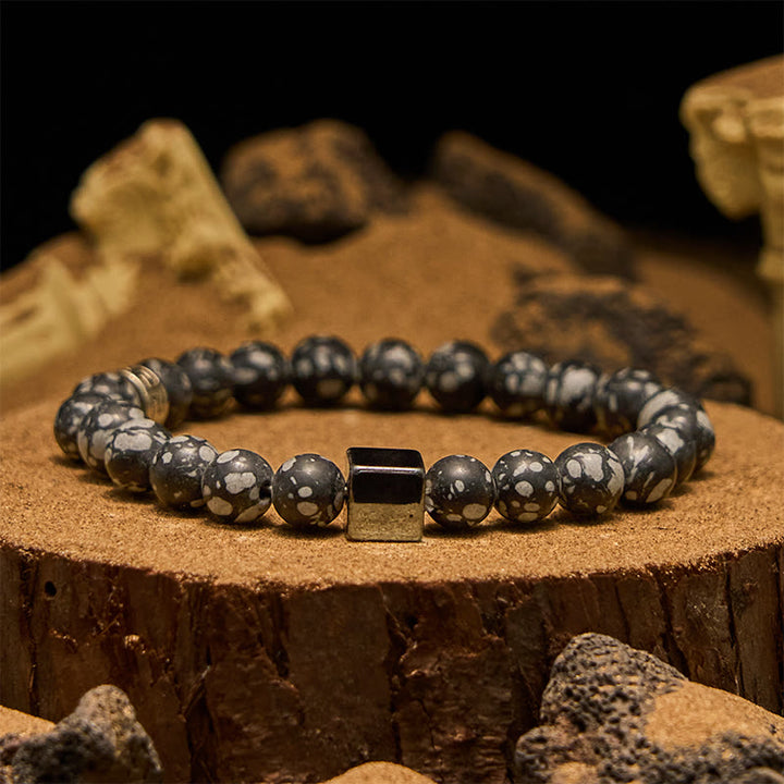 Bracciale Olivenorma con perline di ematite a taglio quadrato in ossidiana fiocco di neve