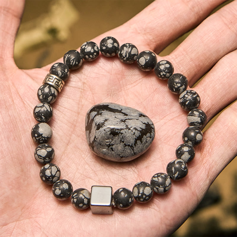 Bracciale Olivenorma con perline di ematite a taglio quadrato in ossidiana fiocco di neve
