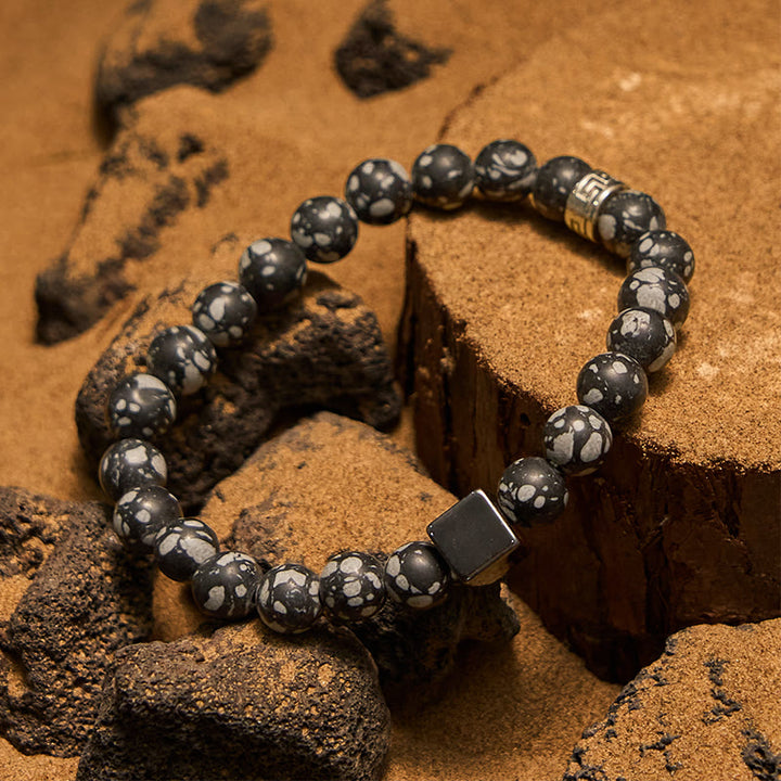 Bracciale Olivenorma con perline di ematite a taglio quadrato in ossidiana fiocco di neve