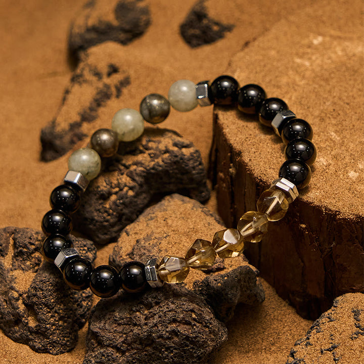 Bracciale Olivenorma con perline di labradorite, ossidiana e quarzo fumé
