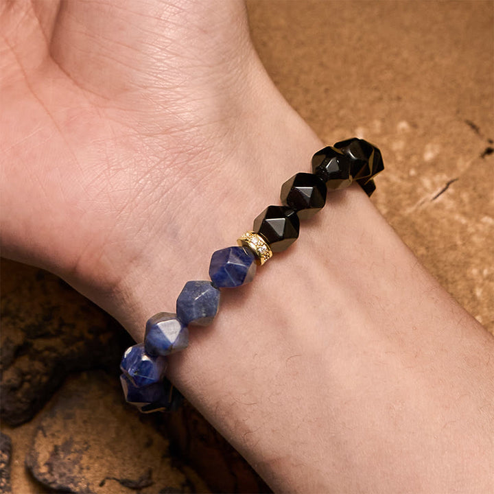 Bracciale Olivenorma in perle di sodalite e ossidiana naturale sfaccettata