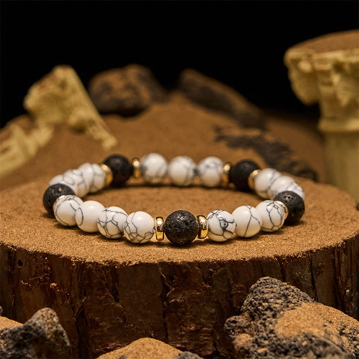 Bracciale Olivenorma con perline in pietra lavica naturale turchese bianco
