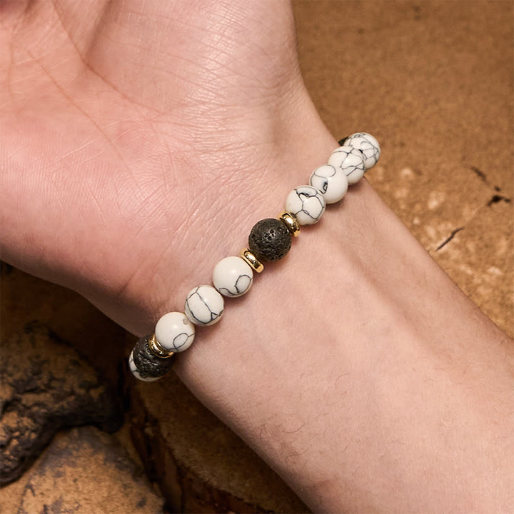 Bracciale Olivenorma con perline in pietra lavica naturale turchese bianco