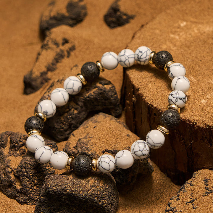 Bracciale Olivenorma con perline in pietra lavica naturale turchese bianco