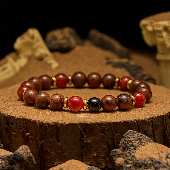 Bracciale Olivenorma in perline di corallo rosso, ossidiana e mogano naturale