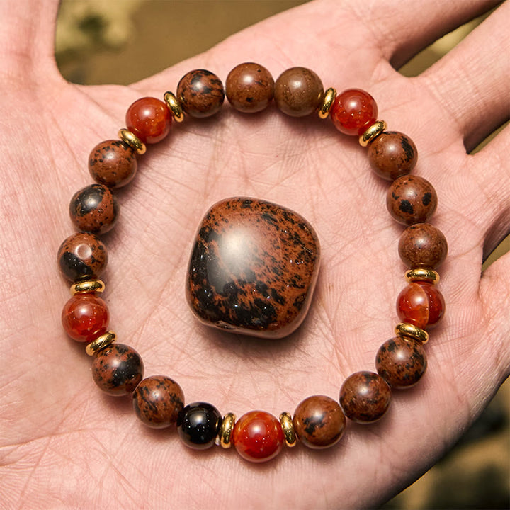 Bracciale Olivenorma in perline di corallo rosso, ossidiana e mogano naturale
