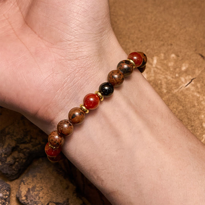 Bracciale Olivenorma in perline di corallo rosso, ossidiana e mogano naturale