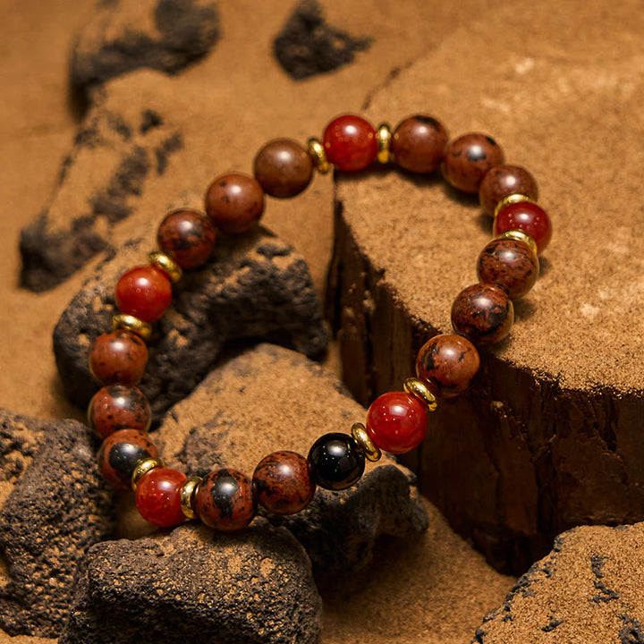 Bracciale Olivenorma in perline di corallo rosso, ossidiana e mogano naturale