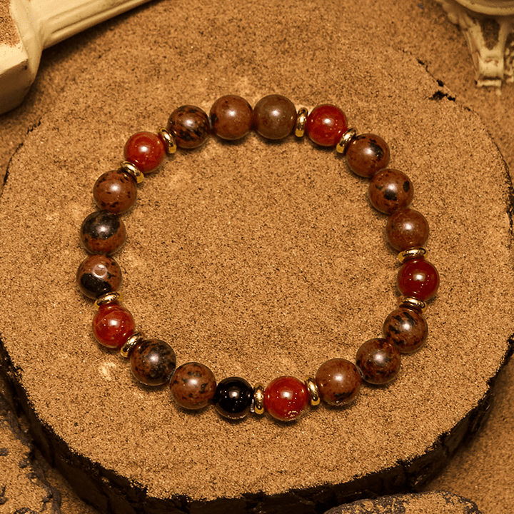 Bracciale Olivenorma in perline di corallo rosso, ossidiana e mogano naturale