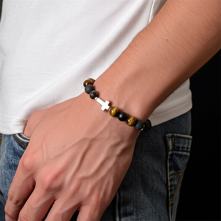 Bracciale con croce in perline di pietra lavica e occhio di tigre Olivenorma