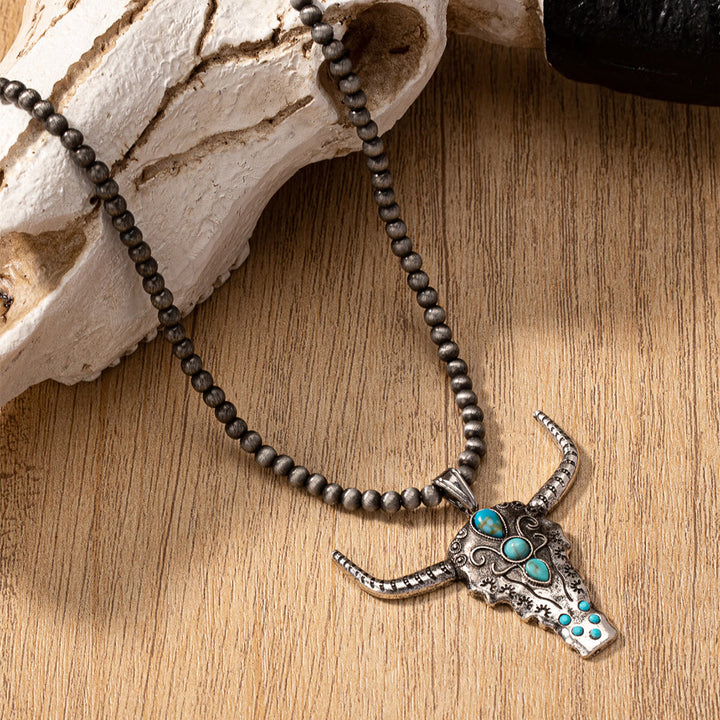 Collana con ciondolo a forma di testa di toro turchese con perline in pietra naturale Olivenorma