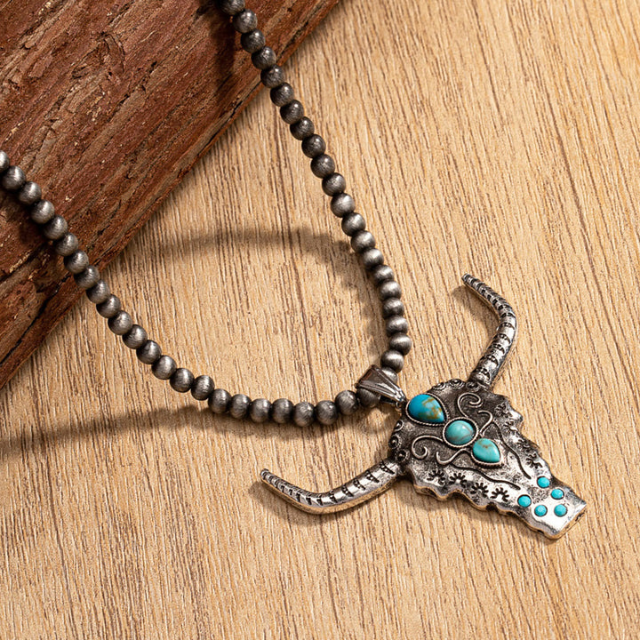 Collana con ciondolo a forma di testa di toro turchese con perline in pietra naturale Olivenorma