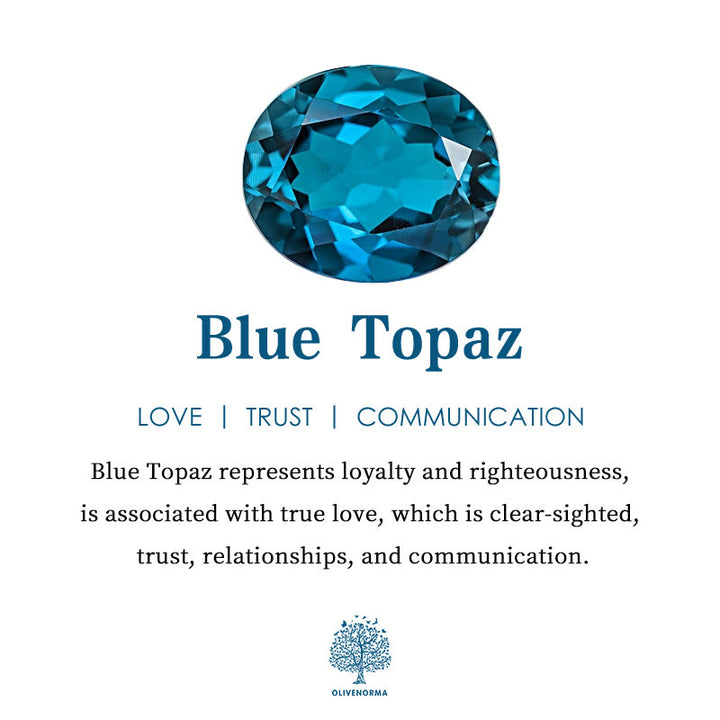 Anello Olivenorma con corona a goccia e topazio blu